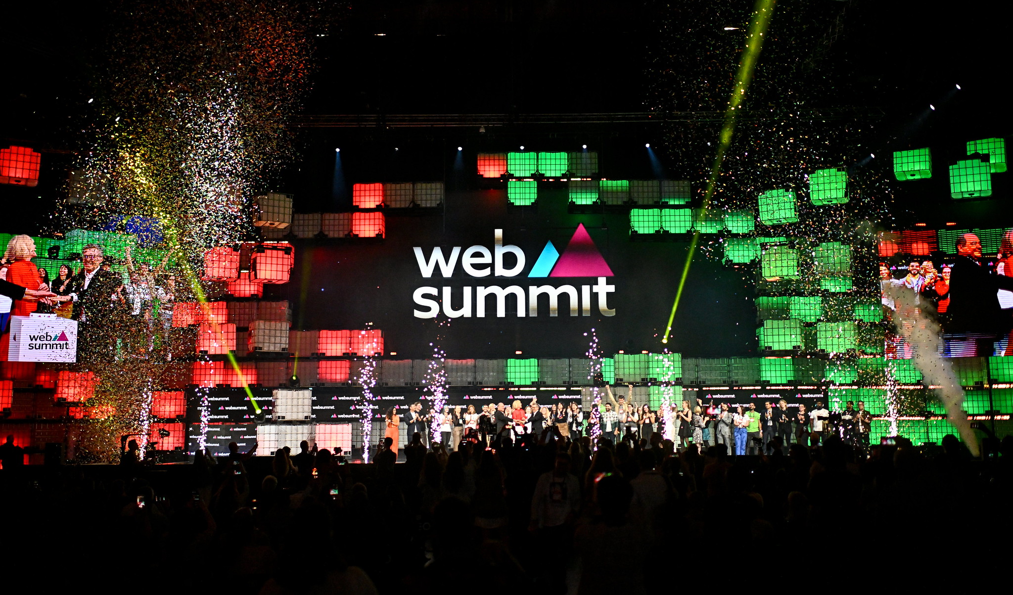 Katherine Maher, CEO, Web Summit, centre, António Costa Silva, Minister of the Economy and Maritime Affairs, Government of Portugal, left, and Carlos Moedes, Mayor, City of Lisbon, on Centre Stage during the opening night of Web Summit 2023 at the Altice Arena in Lisbon, Portugal.