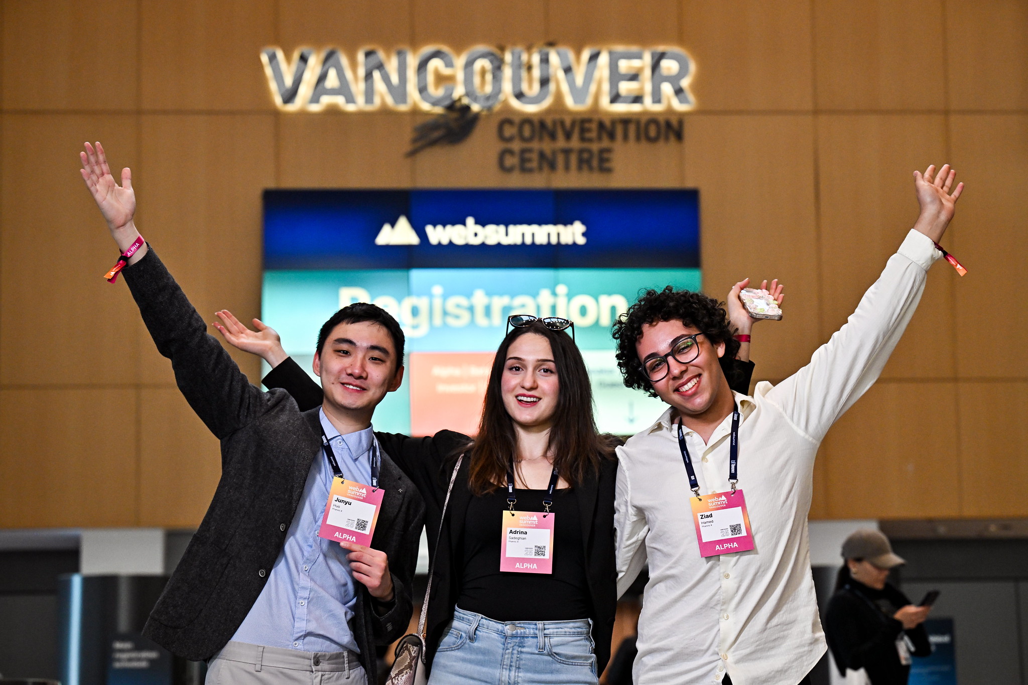 Attendees at registration in advance of Web Summit Vancouver 2025 at Vancouver Convention Centre in Vancouver, Canada